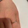 Wedding ring with 10 small stones and a slim profile