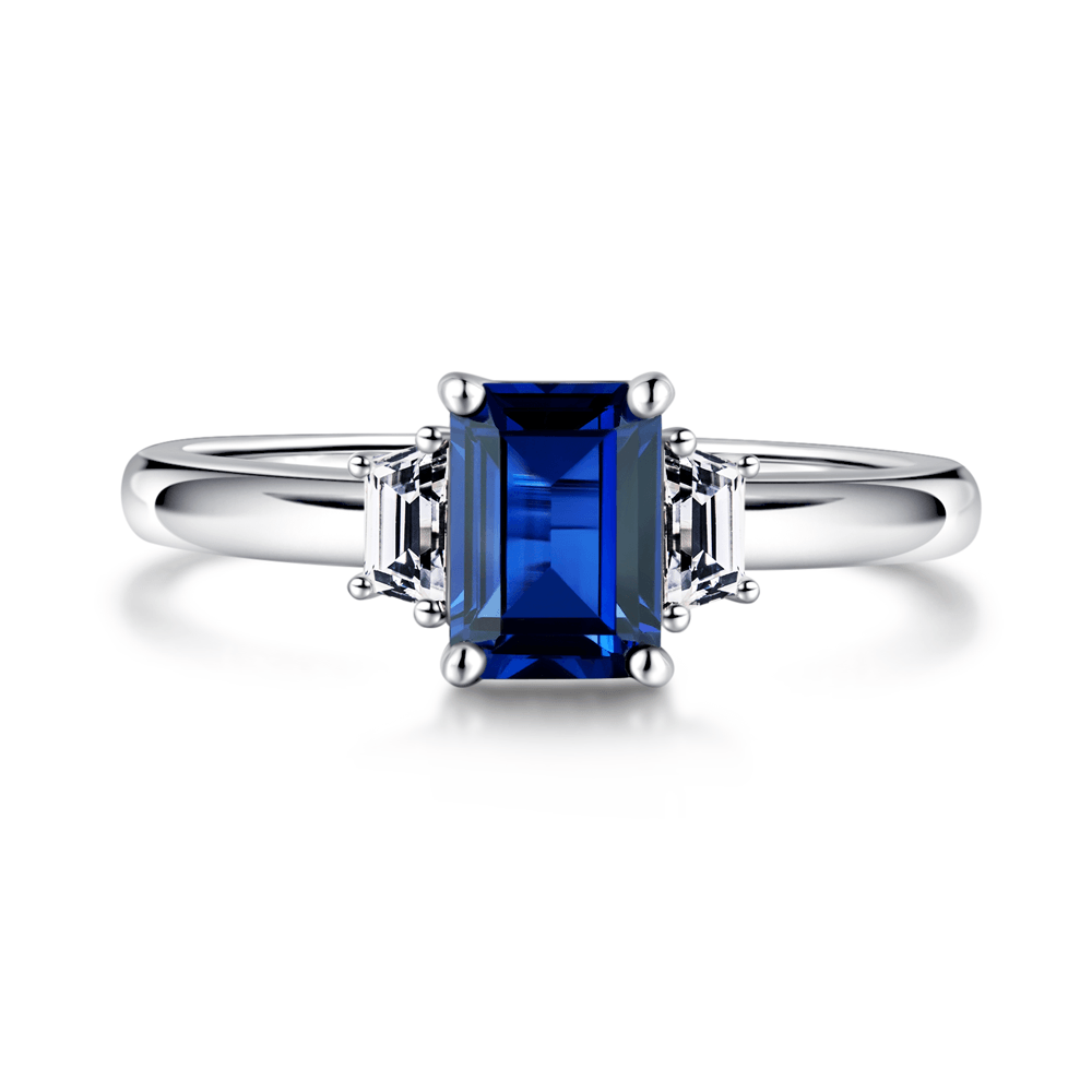 925 Sterling Silver 3CT. Emerald Cut Blue Sapphire and White Sapphire Three Stone Ring