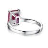 Engagement ring with emerald cut 3ct ruby centre stone