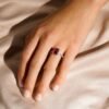 Polished sterling silver engagement ring with vibrant ruby stone