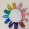 Alexandra charm measuring 23 x 14 mm with refined proportions