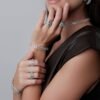 Bold knuckle-style sterling silver ring with textured aqua detailing