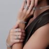 Open bangle with decorative texture and polished modern lines
