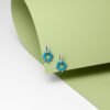 Elegant sterling silver earrings with turquoise and polished diamond accents