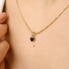 Blue sapphire pendant featuring a 5×4 mm oval gemstone