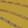 Bracelet in 6.75 inch length with emerald cut accents