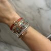 Pearl and CZ diamond bangle with pave-style detailing