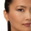 Earring jackets designed to frame studs with a clean silhouette