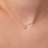 Gold-plated sterling silver initial necklace with prong-set sparkle
