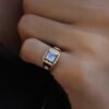 Diamond moonstone signet ring with delicate side sparkle