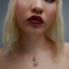Pendant necklace featuring premium CZ diamond and reflective faceted surface
