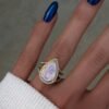 925 Sterling Silver ring featuring a teardrop moonstone and pave CZ diamonds