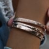 Gold plated sterling silver bangle with diamond-inspired stud detailing
