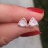 Trillion moonstone stud earrings with thick gold plating on sterling silver