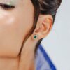 925 Sterling Silver Emerald and Baguette Diamond Halo Stud Earrings - Image 2