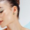 925 Sterling Silver Emerald and Baguette Diamond Halo Stud Earrings - Image 4
