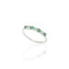 Half eternity ring with prong-set CZ emerald and diamond stones