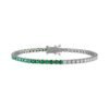 Sterling silver tennis bracelet with alternating emerald and diamond stones