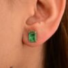 Compact sterling silver stud earrings measuring 8.2 mm by 6.1 mm