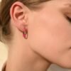 Compact huggie hoop earrings with colourful enamel finish