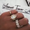 Five oval stones create a timeless band ring design