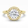 Halo ring with four-prong setting and pavé detailing