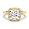 Engagement ring featuring a four-prong setting and pavé accents