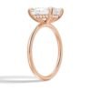 Gold-plated ring with prong and halo stone settings