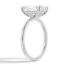 Radiant cut engagement ring with a refined four-prong setting