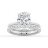 Polished silver ring with four-prong oval setting