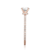 Engagement ring featuring princess cut stone and detailed pave band