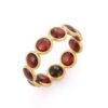 925 sterling silver eternity band with red garnet stones