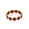 Round garnet stones set all the way around