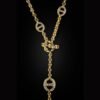 Lariat necklace featuring 16-inch micro-link chain and 6-inch drop