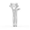 Elegant ring with prong, pave and halo stone settings