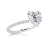 Elegant engagement ring with heart shaped stone and clean silhouette