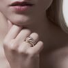 Bold sterling silver ring with a distinctive interlocking shape