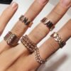 Simple ring with a large bead-shaped detail