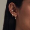 Thick gold-plated sterling silver ear cuff with striking design
