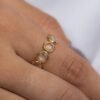 Eternity ring with bezel-set lemon topaz stones