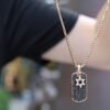 Mens dog tag necklace featuring thick gold plating