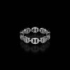 Micro Dame Tri Link III ring with a distinctive linked design
