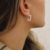 Gold-plated sterling silver earrings with a compact paper clip shape