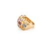 Band ring featuring graceful oval stones and smaller diamond accents
