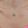 Elegant necklace with petal-like forms and balanced stones