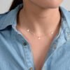 Delicate sterling silver necklace with three heart charms