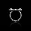 Ring with open oval design and tri-link band detail