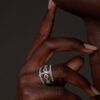 Ring featuring premium CZ diamond accents and tri-link design