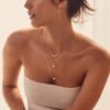 Chain stud earrings featuring a pearl and CZ diamond drop