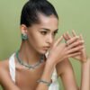 Revolve earrings featuring turquoise accents and premium CZ diamond stones